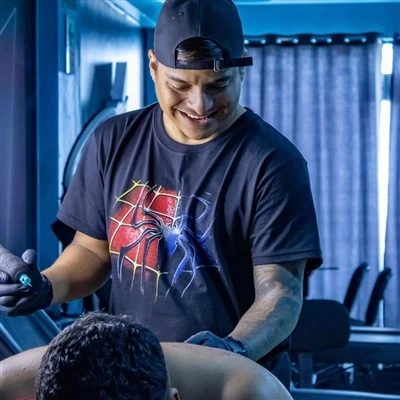 Cara Memilih Artis Tato Anda